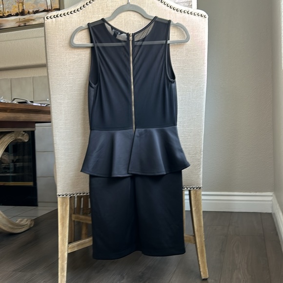 GUESS fitted peplum cocktail dress. Full mesh back & sexy mesh detail on front. - Picture 6 of 9